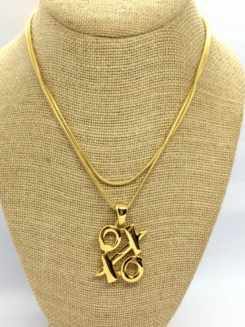 VINTAGE ANNE KLEIN Necklace Gold Tone XO Pendant Long Snake Chain